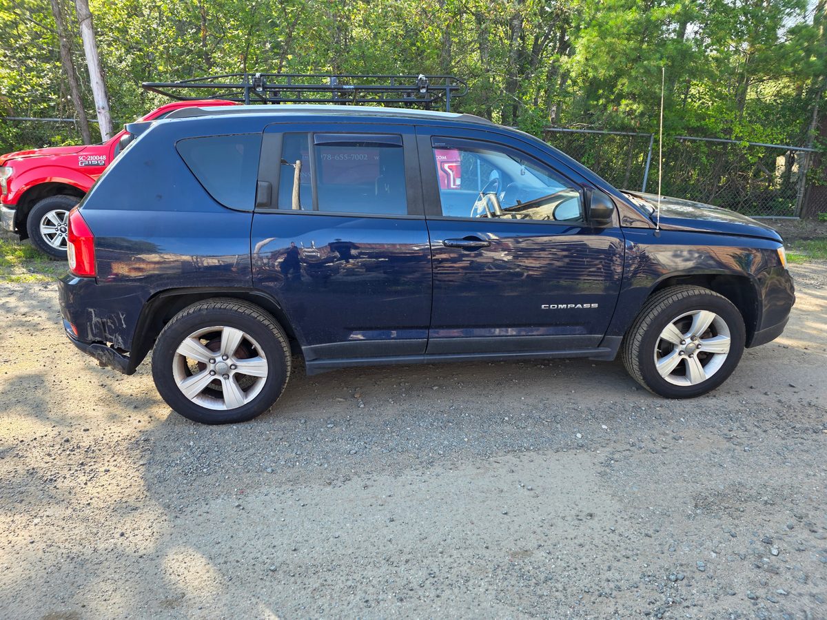 2012 Jeep Compass Latitude True Blue Pearl - driver side front wheel